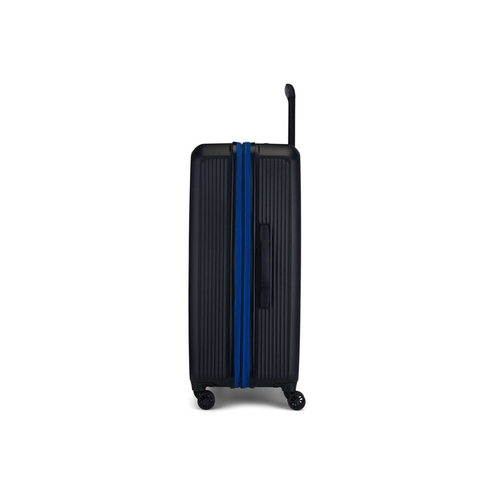 The Reebok Action Duo 2 Piece Luggage Set features a black lightweight suitcase with vertical ridges, blue zipper, side handle, and four spinner wheels, shown upright with its handle extended against a white background.