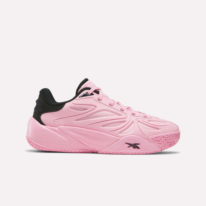 The Reebok Angel Reese 1 Shoes for big kids, shown in Expressive Pink with a textured sole, black heel, and subtle Reebok logo—echoing the style of popular kids basketball shoes—are displayed in a side profile against a plain light background.