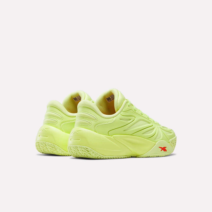 The Reebok Angel Reese 1 Shoes - Big Kids in neon yellow feature textured soles, curved detailing, and a small red logo by the heel, shown from the back and side on a white background.