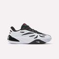 The Reebok Angel Reese 1 Basketball Shoes are modern low-top sneakers with a white and black wavy design, black laces, a textured white sole, red tongue accents, and the Reebok logo on the side.