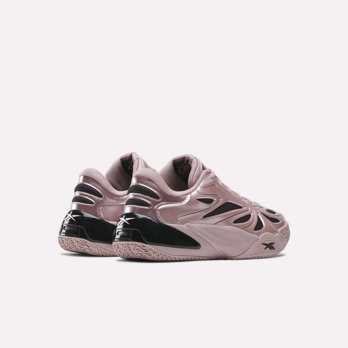 A pair of Reebok Angel Reese 1 Basketball Shoes in mauve with black accents and a chunky sole, featuring the Energy Return System for comfort, displayed on a white background at an angle showing the side and back.