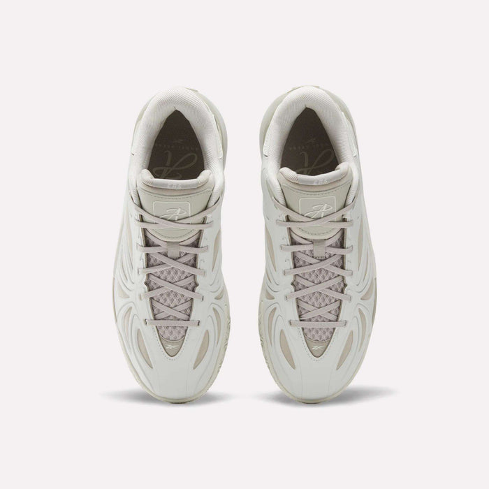 Top view of the Reebok Angel Reese 1 Basketball Shoes in light beige, featuring wavy line designs, mesh tongue detail, and neatly tied laces—these performance sneakers with Energy Return System are displayed side by side on a white background.
