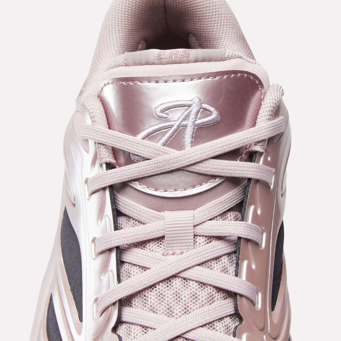 Top view of the Reebok Angel Reese 1 Basketball Shoes: features light pink laces, a shiny pink tongue with a stylized A logo, and mesh fabric with plastic accents—evoking Angel Reese's signature style.