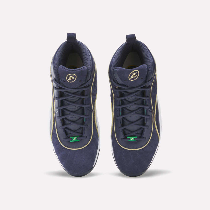 A pair of Reebok Answer III Shoes in navy blue with gold trim, green lace accents, and a circular logo on each tongue are symmetrically arranged on a plain white background, showcasing their retro basketball style.