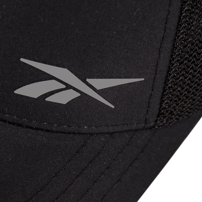 Close-up of the Reebok Athletic Cap in black, featuring a silver logo and right-side mesh detailing for comfort. Made from recycled polyester.