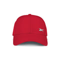 The Reebok Badge Cap in bright red is shown from the front, featuring a small white embroidered logo on the lower right crown and an adjustable buckle for comfort.