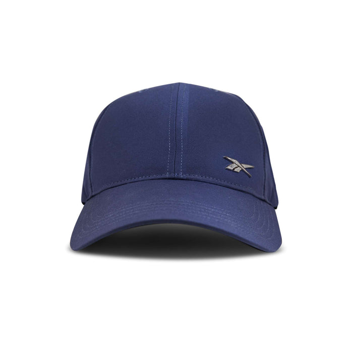 The Reebok Badge Cap in navy blue features a small silver logo on the front and is displayed from a front-facing view against a plain white background.