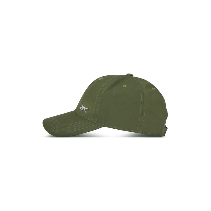 The Reebok Badge Cap is an olive green baseball hat featuring visible stitching and a small metallic Reebok logo on the front left, displayed against a white background.