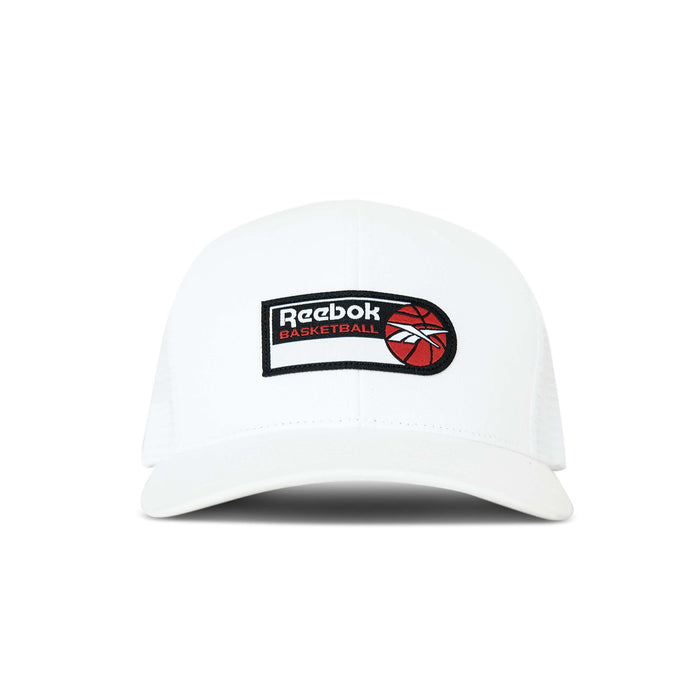 The Reebok Basketball Trucker Cap is a white snapback hat with a curved brim, featuring a logo patch and red basketball graphic on the front, perfect for adding sporty style to any look.