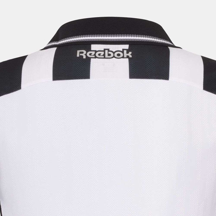 The image shows the upper back of the Botafogo Men's Home Jersey by Reebok, featuring black and white stripes, a black collar, and a white Reebok logo near the top center.