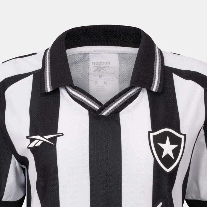 The Botafogo Women's Home Jersey by Reebok features classic black and white stripes, a black collar, Reebok logo on the right chest, and star shield badge on the left—perfect for the 25/26 football shirt collection.