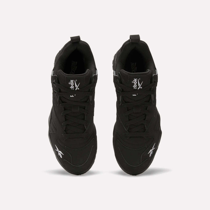 A pair of Brutus Low Shoes by Reebok in black, viewed from above with the Reebok logo on the tongue and sides—ideal for adding street-ready style to any outfit.