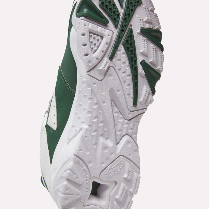 Close-up of the sole of the Reebok Brutus Low Shoes in green and white, featuring textured tread patterns and detailed rubber grip designs inspired by classic Reebok heritage styles.