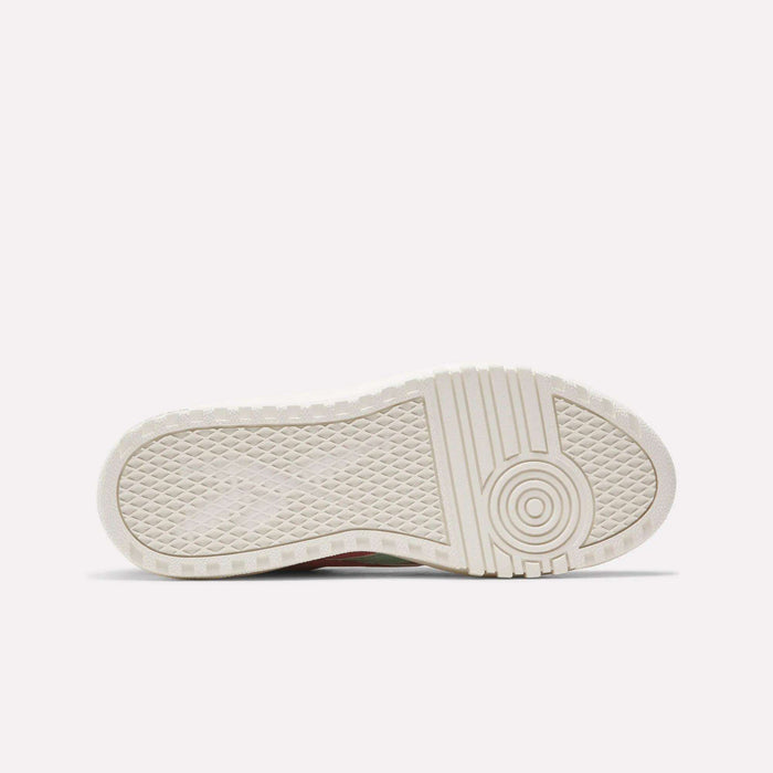 The image displays the off-white sole of Reebok Campio Extra Women's Shoes, featuring a textured pattern with geometric shapes and concentric circles, typical of platform midsoles, set against a plain white background.