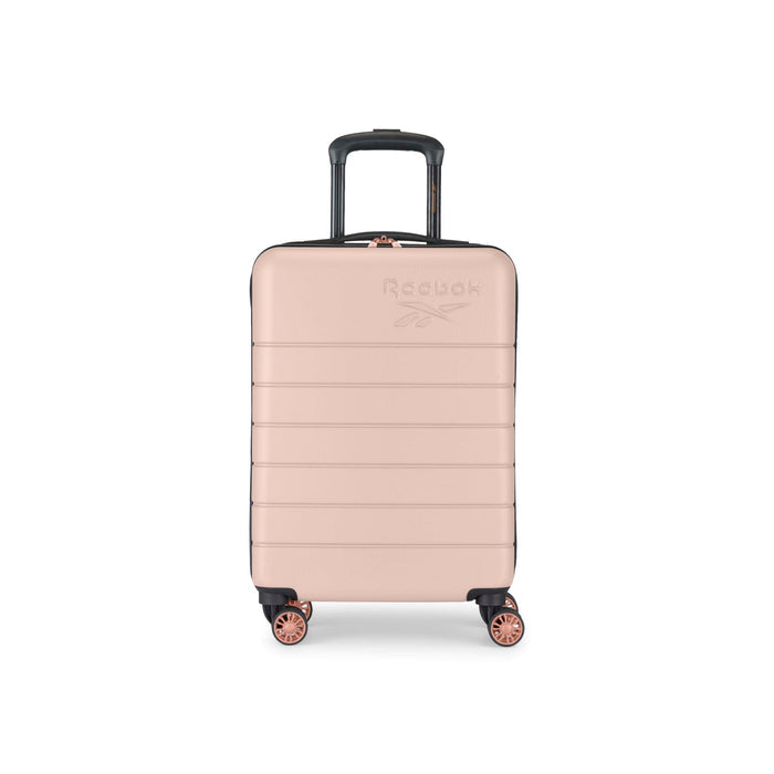 A rose gold hard-shell suitcase with four wheels and a black retractable handle, featuring the Reebok logo embossed on the front. The suitcase is photographed against a white background.