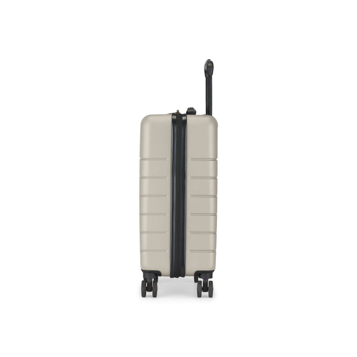 A durable, hard-shell light gray suitcase with spinner wheels and a black zipper is shown upright from the side with its telescopic handle extended—part of the Reebok Captain 2 Piece Luggage Set.