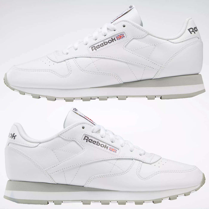 A pair of Reebok Classic Leather Shoes is displayed from left and right sides, highlighting the Reebok logo, Union Jack detail, durable leather uppers, white laces, and light gray soles for a timeless retro look.