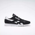 The Reebok Men's Classic Nylon Shoes in black and white feature white side stripes, a white sole, and signature Reebok logos—ideal everyday sneakers for men—displayed in a side profile on a plain light background.