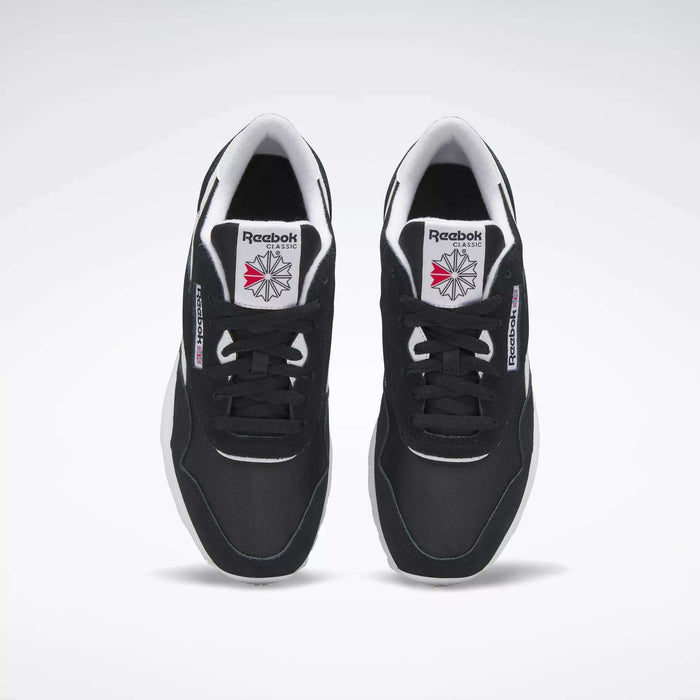 A pair of Men's Classic Nylon Shoes by Reebok in black with white soles and the Reebok logo on the tongue, viewed from above on a plain white background—perfect classic sneakers for everyday wear.