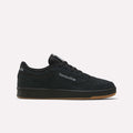 The Reebok Club C 85 Shoes feature a low-profile black suede upper, black sole, gum outsole, and a white Reebok logo on the side, shown against a plain light background.
