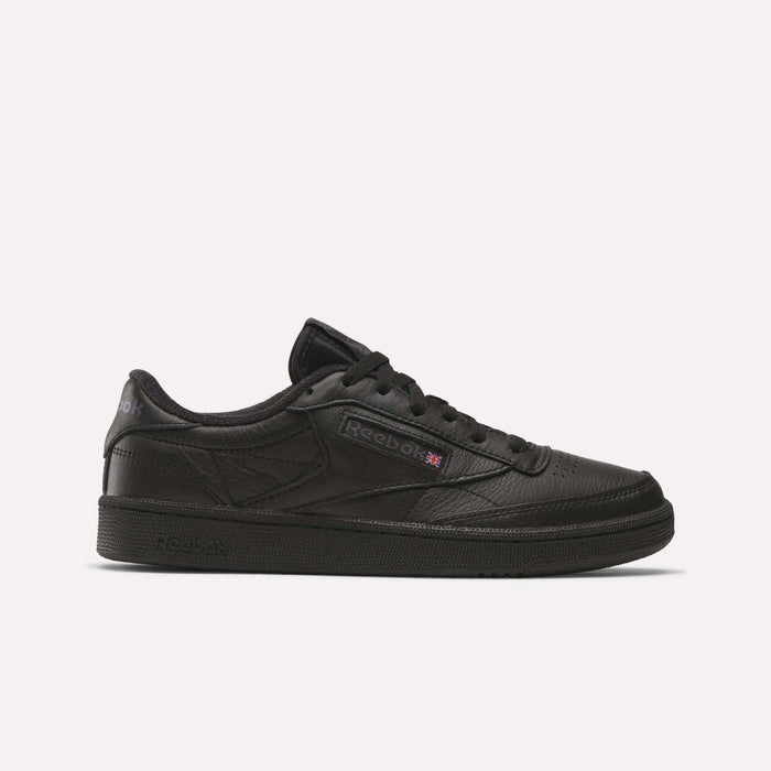 The Reebok Club C 85 Shoes feature a black leather upper, black sole, and black laces in a low-top design, shown in side profile on a plain white background.