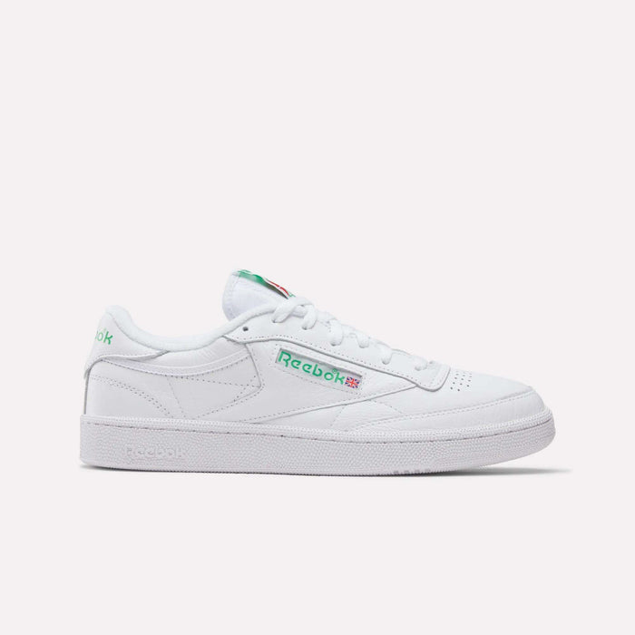 The Reebok Club C 85 Shoes are white leather sneakers with green and red accents, featuring the Reebok logo and Union Jack flag on the side, shown against a plain light background.