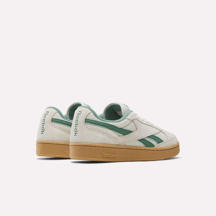 The Reebok Club C Grounds 70 Shoes in white with green accents and gum soles, made from premium suede, are displayed side by side on a white background, evoking subtle '70s inspiration.