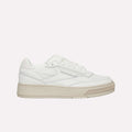 The Reebok Club C LTD Shoes are white low-top sneakers with a beige sole, perforated details, and white laces, shown in a side profile view—a timeless lifestyle classic inspired by tennis heritage.