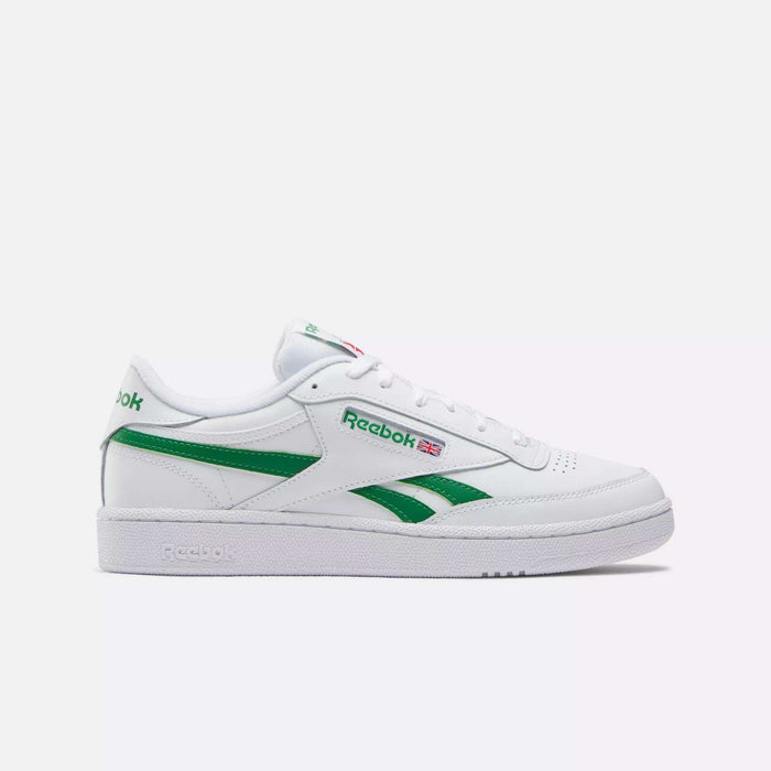 The Reebok Club C Revenge Shoes feature a classic white leather low-top design with green logo and side stripes, set against a plain white background. These casual trainers offer a timeless silhouette and durable rubber sole for everyday wear.