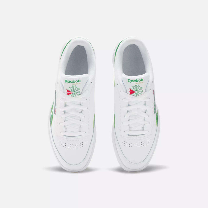 Top view of Reebok Club C Revenge Shoes in white with green and pink accents, laces, perforated toe boxes, and the classic Reebok logo with a green starburst on the tongue—ideal casual leather footwear.