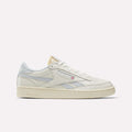 Side view of Reebok Club C Revenge Vintage Shoes in white full-grain leather with light gray accents, cream-colored sole, and subtle side branding, displayed against a plain white background.