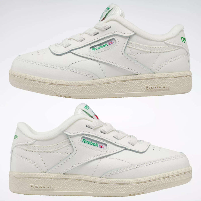 The Reebok Kids' Club C Shoes for babies and toddlers feature a white design with green details and the classic logo on the side, shown from a side view against a plain white background—ideal for adding retro '80s style to any outfit.