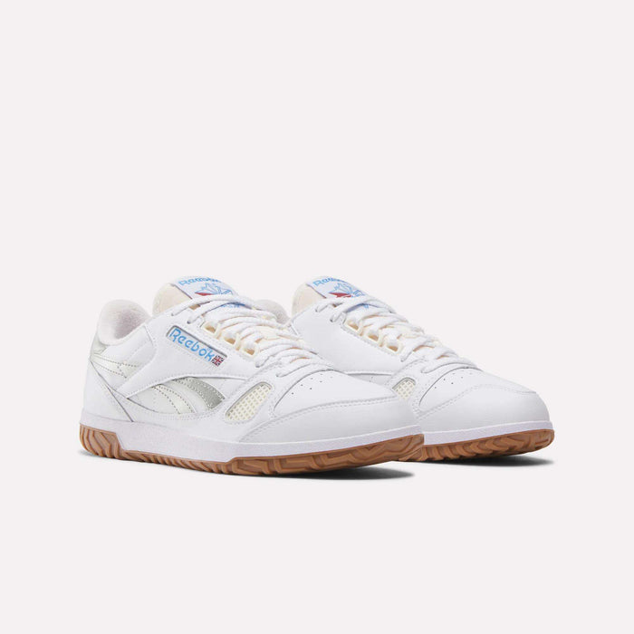 The Reebok Defiance 88 Shoes are white with gum soles, blue and red logos, mesh panel accents, and subtle metallic details, shown on a plain white background.