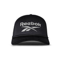 A black Reebok Deluxe Aero Cap is shown from the front with the white Reebok logo on the front panel, a curved brim, mesh sides, and an adjustable snapback closure.
