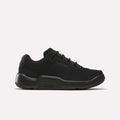 Introducing the Reebok DMX Comfort+ Classic, a black low-top sneaker crafted from premium leather. Featuring a thick sole, lace-up closure, and subtle side perforations for breathability, these shoes are designed with all-day walking comfort in mind. Shown here in Black/Black/Black, displayed in side profile against a plain white background.