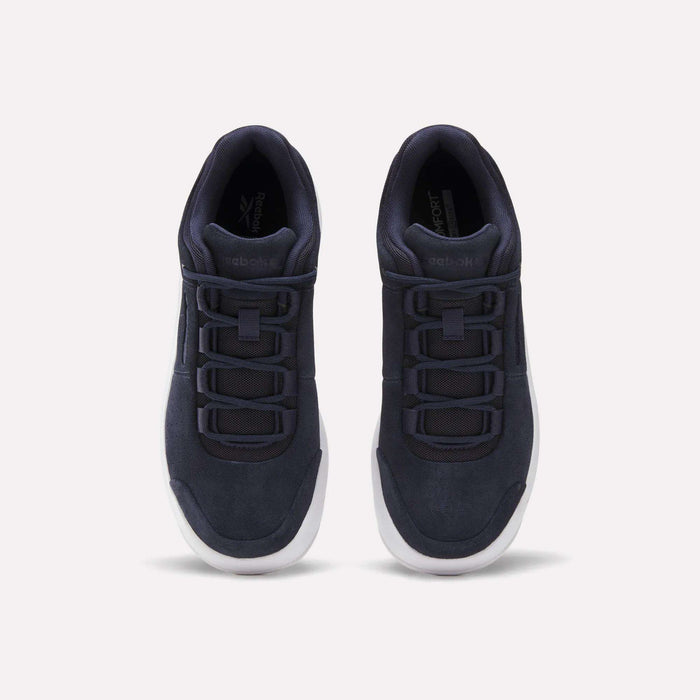 A pair of Reebok DMX Comfort+ Classic black athletic walking shoes with premium leather accents and white soles, viewed from above and placed side by side on a plain white background.