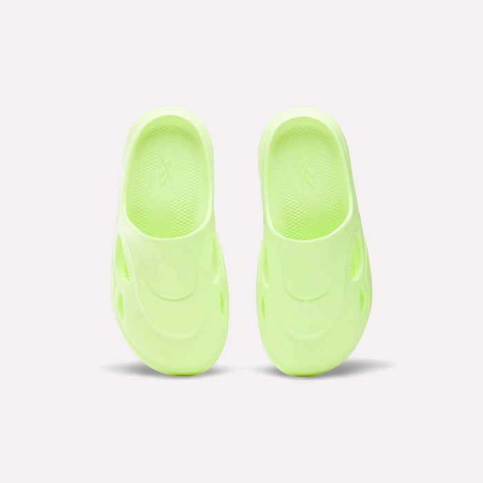 A pair of Reebok DMX Recovery Mules in green, crafted from molded EVA for comfort.