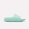 The Reebok DMX Recovery Walking Slides in light teal feature a ribbed texture, open toe, and thick sole with moving air cushioning, displayed in side profile on a white background.