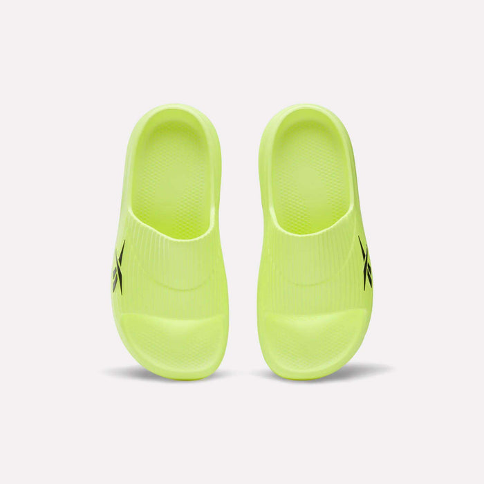 A pair of neon yellow Reebok DMX Recovery Walking Slides with textured footbeds, moving air cushioning, and a black logo on the side, shown from above on a white background.