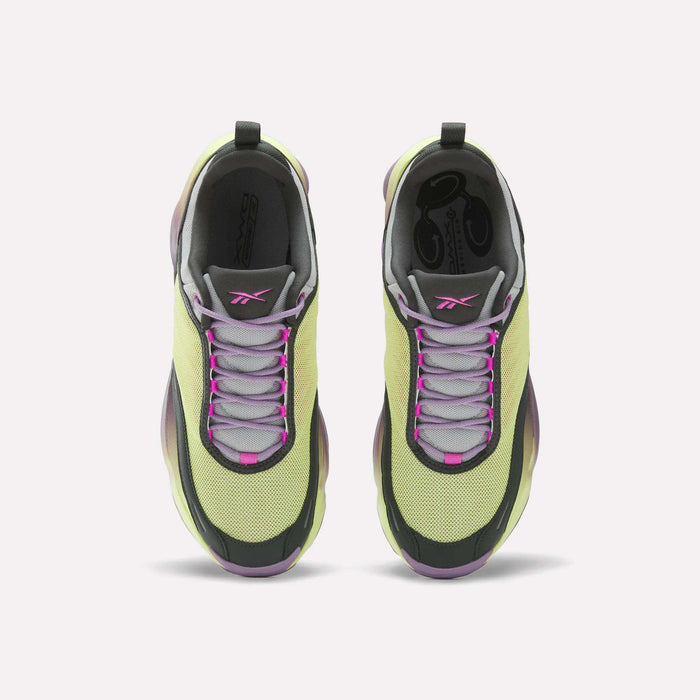 The Reebok DMX Series 3000 Shoes feature light green mesh uppers with purple and pink accents, gray laces, and black trim—offering comfortable wear with advanced DMX moving air technology.