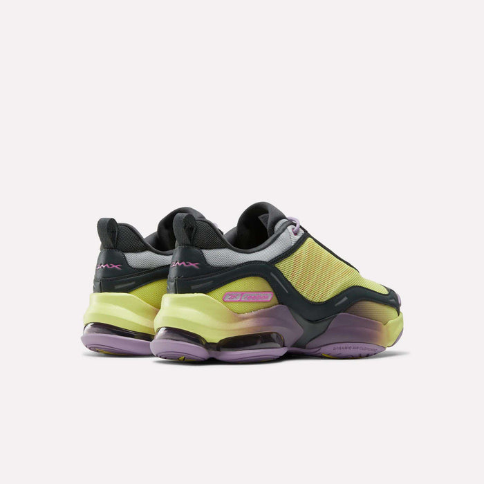 The Reebok DMX Series 3000 Shoes feature a chunky sole, visible DMX moving air technology, and a sporty design in neon yellow, purple, and black, shown from the back at an angle on a plain white background.
