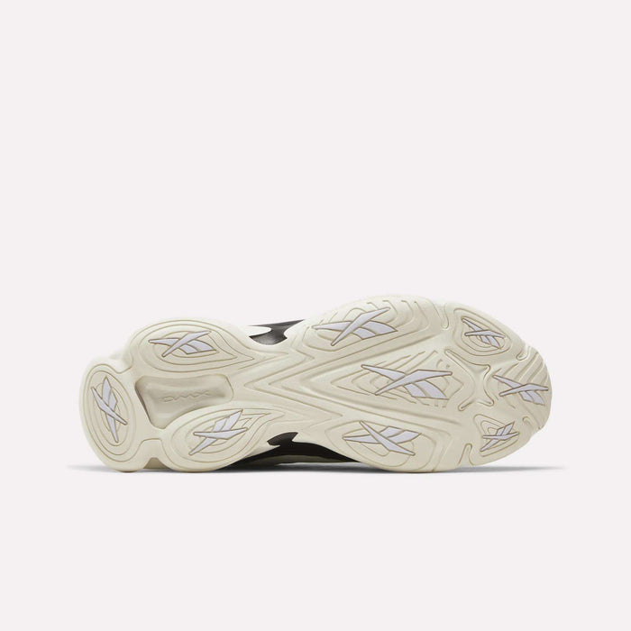 The image displays the bottom view of the Reebok DMX Series 3000 Shoes, featuring a wavy, textured rubber sole in off-white and light gray patterns that emphasize its cushioned design and advanced DMX moving air technology, all presented against a plain white background.