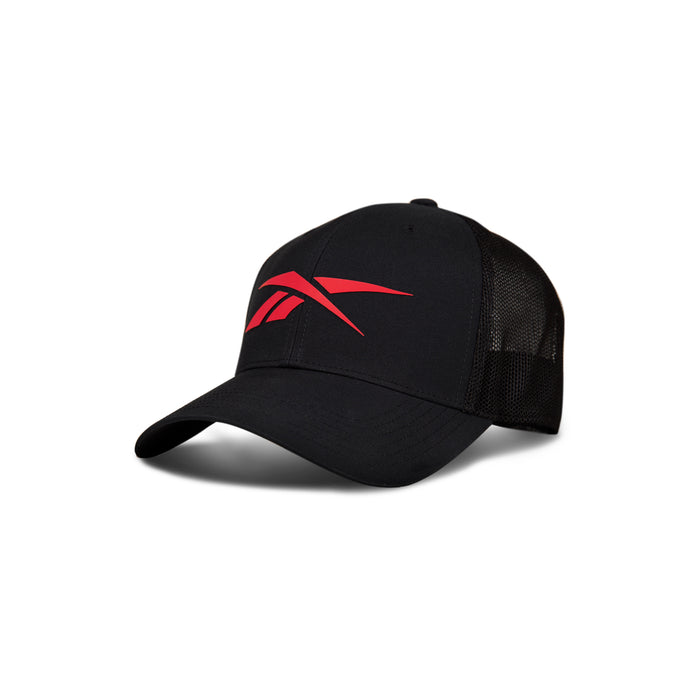 The Elite Cap by Reebok is a black mesh trucker hat with a red abstract logo on the front, a curved brim, and an adjustable back.