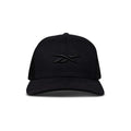 Front view of the Reebok Embroidered Vector Trucker Cap in black, featuring a curved brim, mesh back, and embroidered black Reebok logo on the front panel. Shown against a plain white background.