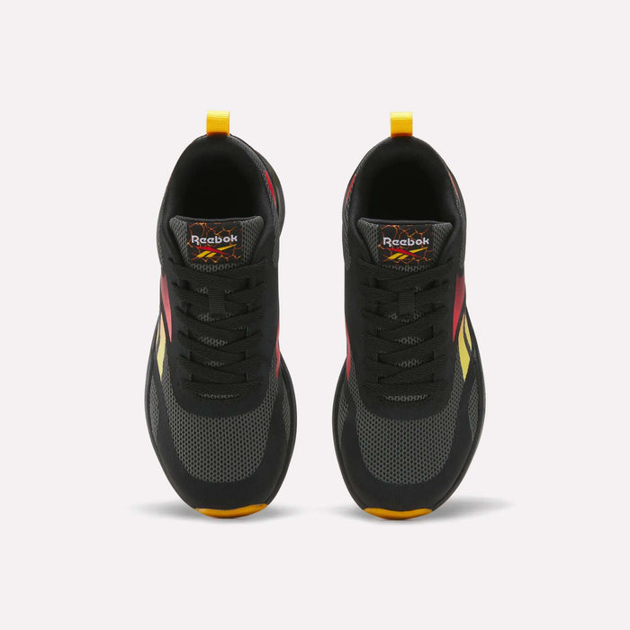 Top view of a pair of Reebok Energen Running Shoes for little kids in black with red, yellow, and orange accents, black laces, and yellow heel pull tabs. These shoes feature a cushioned midsole for added comfort and are positioned side by side on a white background.