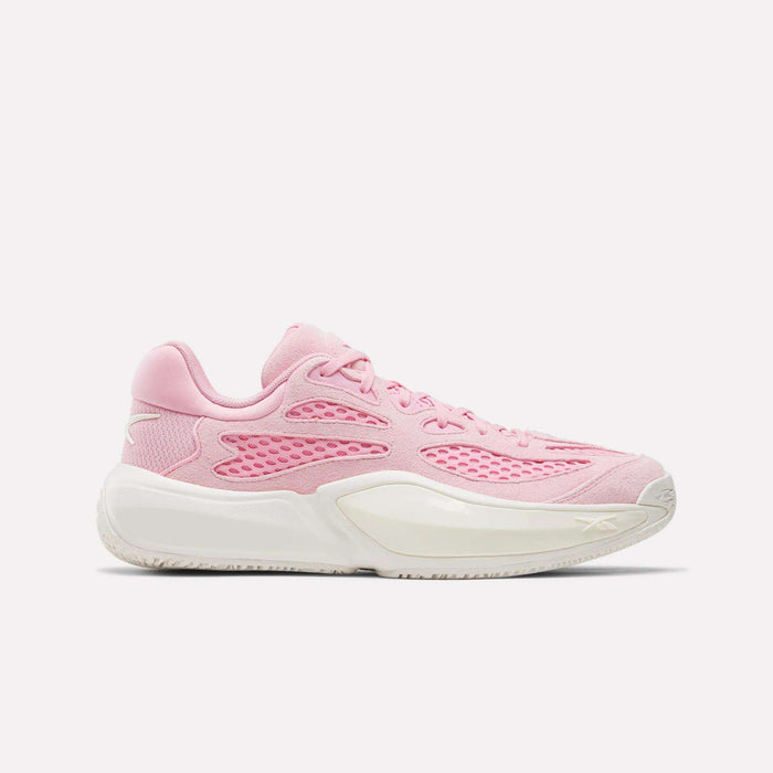 The Reebok Engine A 26 Basketball Shoes in Expressive Pink/Chalk feature mesh and synthetic overlays for stability and energy return, with a white midsole and textured outsole, shown in a side profile on a plain white background.