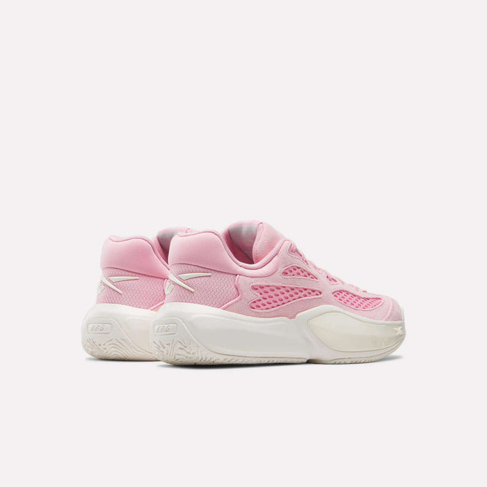 A pair of Reebok Engine A 26 Basketball Shoes in pink with white accents and thick white soles provide excellent stability, displayed side by side on a plain light background.
