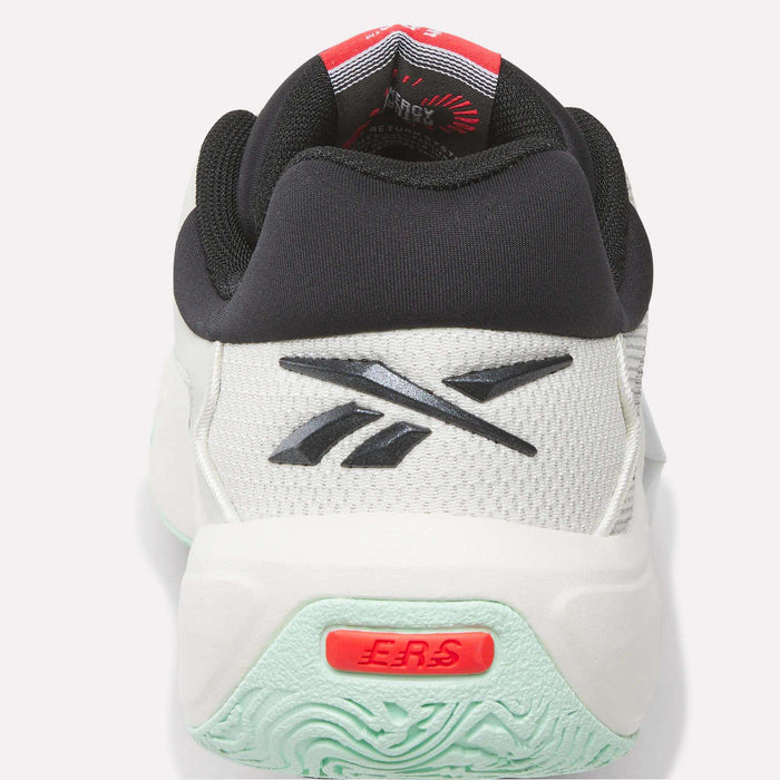 Rear view of a white Reebok Engine A 26 Basketball Shoe with a black Reebok logo, black padded heel collar, green outsole, and red EBS detail on the heel for added stability.
