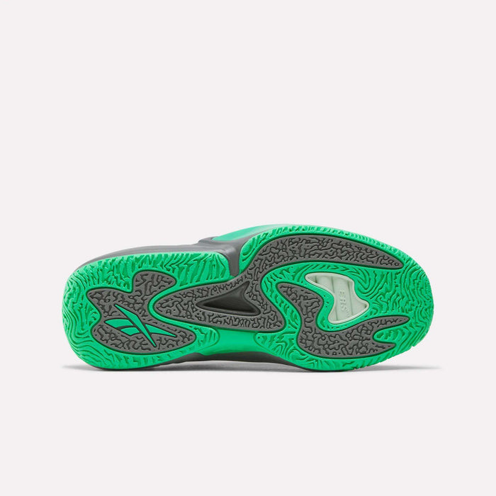 The image displays the sole of the Reebok Engine A 26 Basketball Shoes, showcasing a vibrant green and black wavy pattern with textured grip zones and a futuristic, abstract design. Reminiscent of innovative Reebok basketball footwear, the sole features a mix of curves and lines for enhanced traction.
