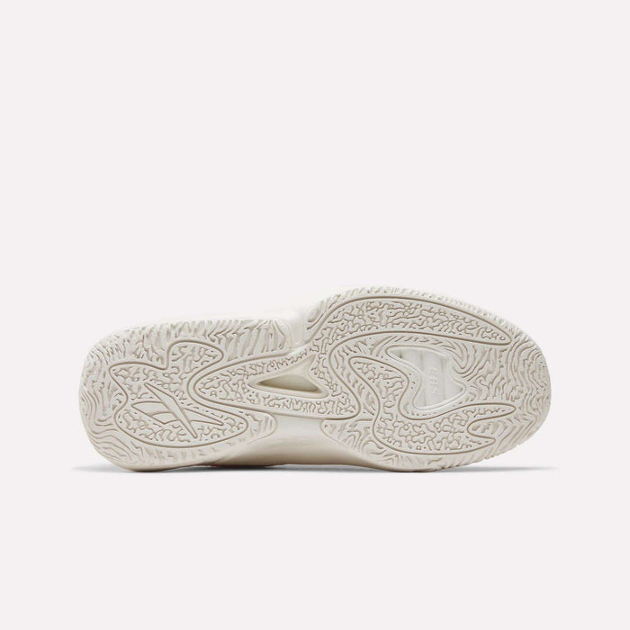 The image shows the bottom view of a Reebok Engine A 26 Basketball Shoe outsole, with a light color and wavy, textured tread pattern designed for grip and stability.